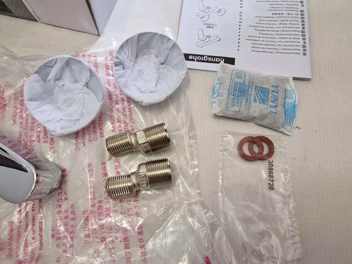 Bateria wannowo-prysznicowa dwuuchwytowa ścienna Hansgrohe Logis srebrny